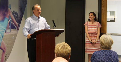 2017 Heart Run Fundraiser Press Release In-Copy Photo PNG Chris Taft, Preferred Mutual CEO, announcing the amount Preferred Mutual employees had raised for the American Heart Association in 2017