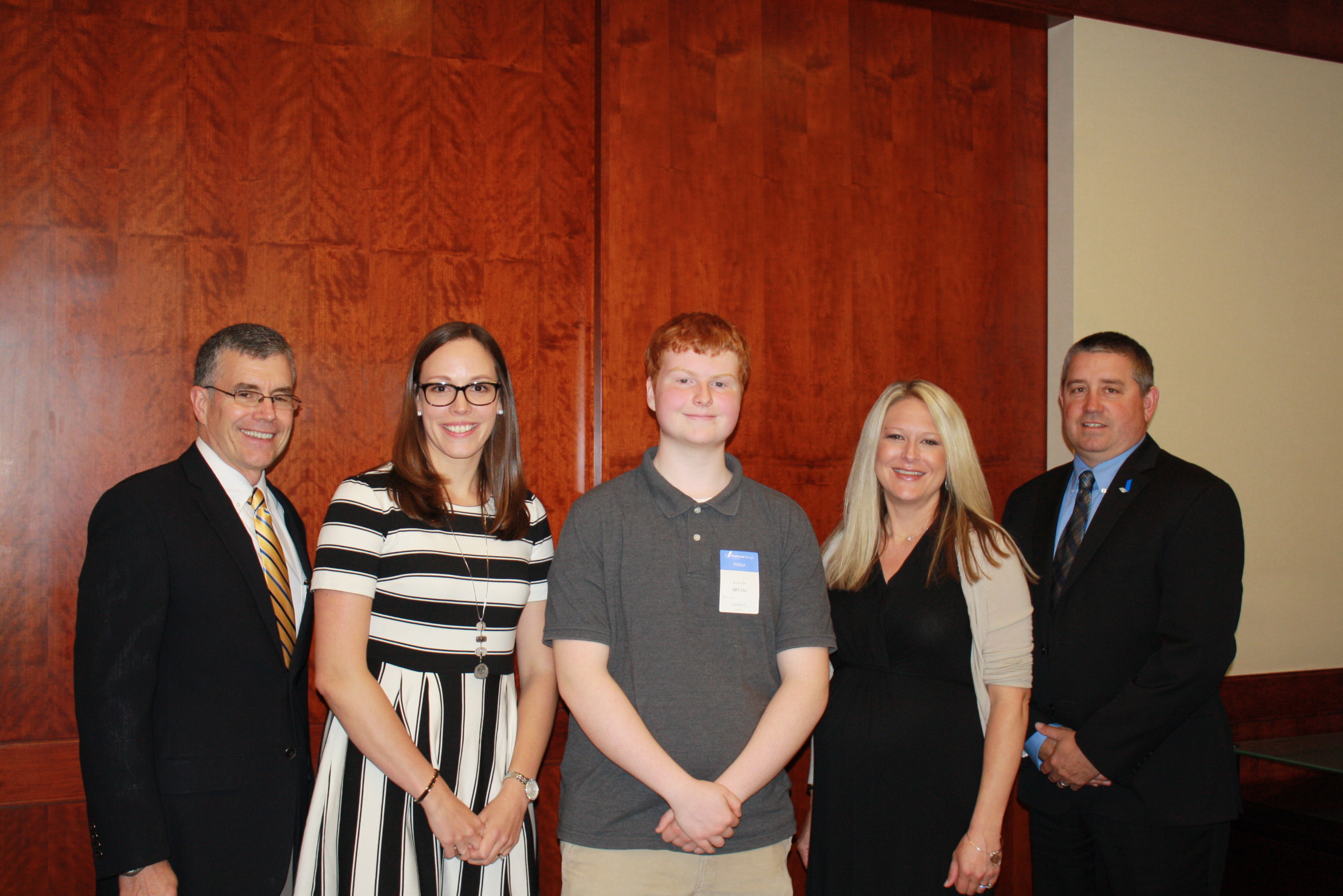 Photo of Brayden white with the Preferred Mutual Insurance Company Foundation Committee