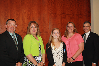 Photo of Alexandra Russo with Preferred Foundation Committee Preferred Foundation Board Members with Scholarship Winner